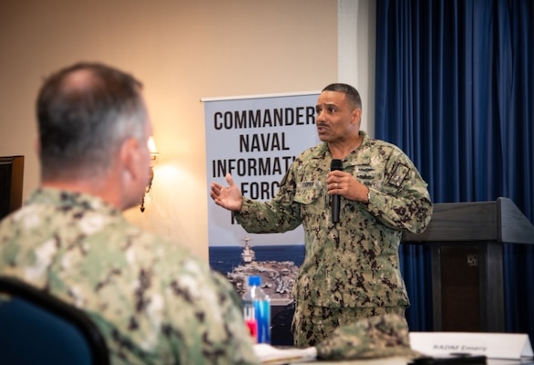 FORCM Augustine Cooper, Force Master Chief, Naval Information Forces, speaks at the 2025 Commander’s Conference at Naval Air Station Joint Reserve Base Fort Worth on June 8, 2025. The three-day event aimed to level-set leadership about the Information Warfare Operational Imperative to share valuable insights, communicate Commander's intent to senior leaders, and hone in on ongoing command initiatives to help operationalize CNIFR.