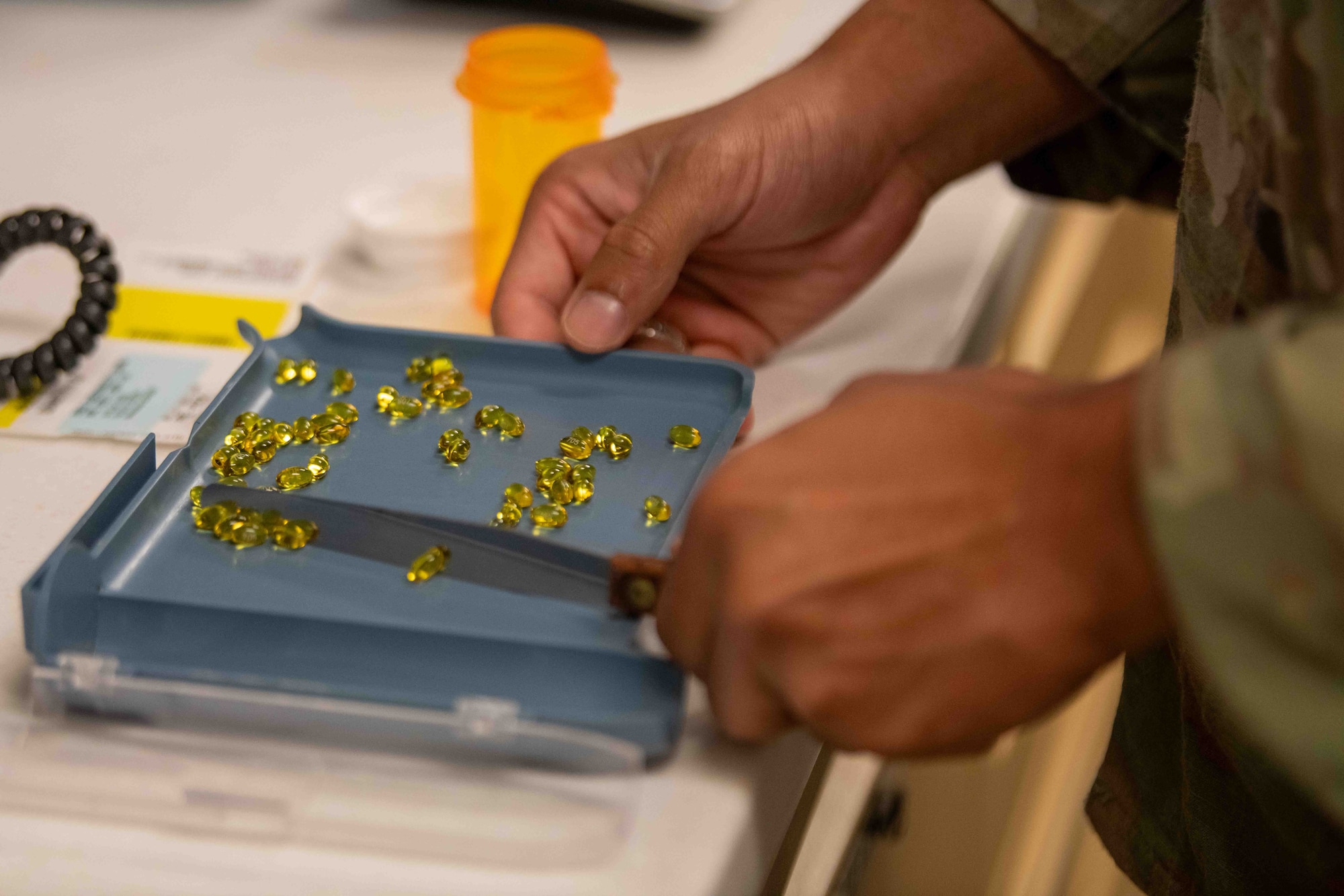Service member handles prescription.