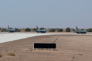 Three U.S. Air Force F-16 Fighting Falcons assigned to the 378th Air Expeditionary Wing’s Mission Generation Force Elements prepare to take off.