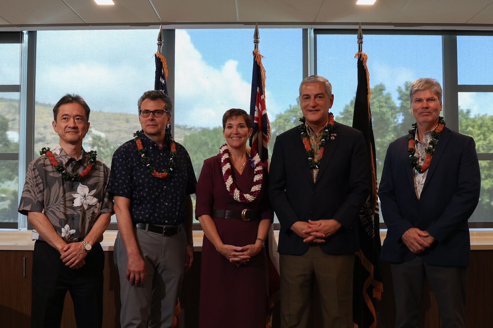 Kelly McKeague, director of the Defense POW/MIA Accounting Agency and Wendy Hensel, the University of Hawaii President sign an education partnership agreement