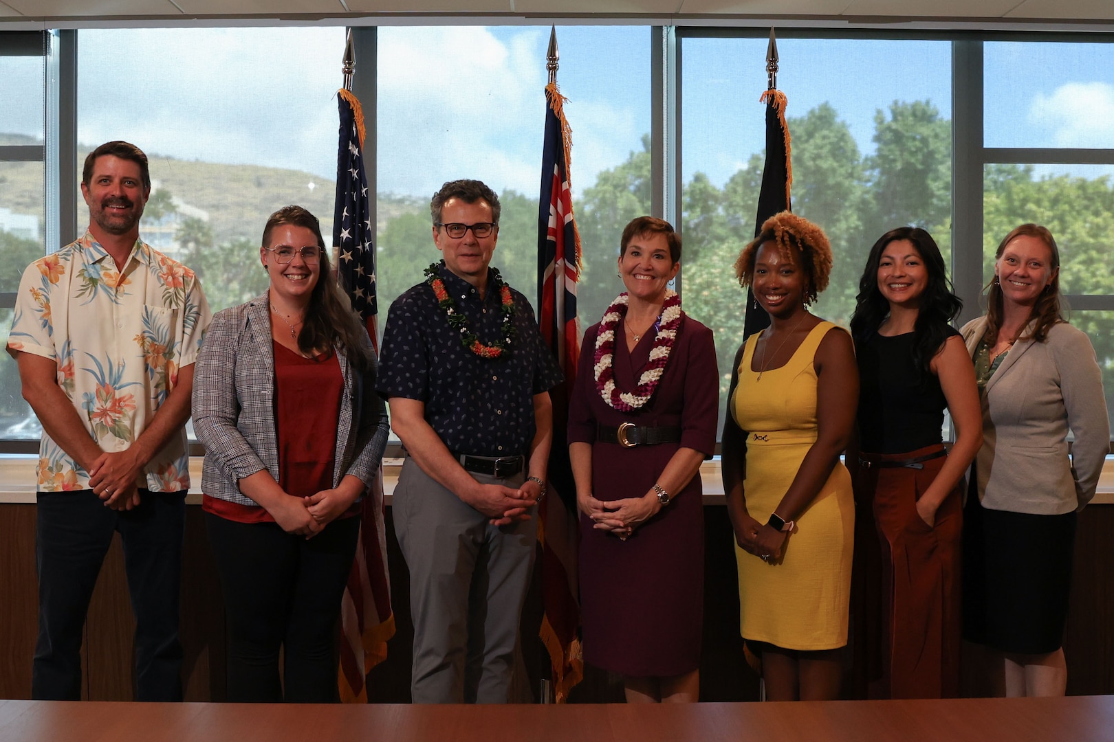 Kelly McKeague, director of the Defense POW/MIA Accounting Agency and Wendy Hensel, the University of Hawaii President sign an education partnership agreement
