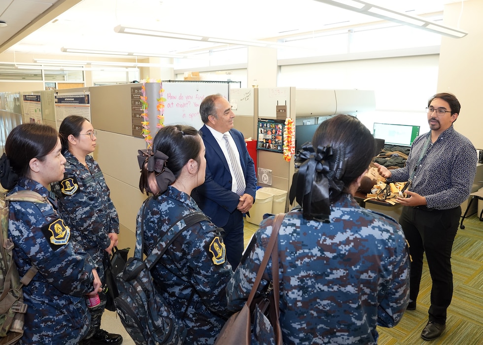 JOINT BASE SAN ANTONIO-FORT SAM HOUSTON – (Aug. 14, 2025) – Andres Martinez-Murillo (right), a principal investigator assigned to Naval Medical Research Unit (NAMRU) San Antonio’s Combat Casualty Care and Operational Medicine directorate, joined by Chief Science Director Dr. Darrin Frye, speaks with flight nurses from the Royal Thai Air Force about cold weather medical research at the Battlefield Health and Trauma Research Institute. The nurses visited medical commands within Joint Base San Antonio to enhance their nursing knowledge and skills to include advancing quality of nursing practice related to disease management. Navy Medicine Research & Development (NMR&D) contributes directly to positive working relationships with partner nation militaries, keeping the scope of Department of Defense capabilities wide, and at the ready, to address emerging threats aboard. NAMRU San Antonio, part of NMR&D, conducts gap-driven combat casualty care, craniofacial, and directed energy research in support of Navy, Marine Corps and joint U.S. warfighter health readiness and lethality while engaged in routine and expeditionary operations. (U.S. Navy photo by Burrell Parmer, NAMRU San Antonio Public Affairs/Released)