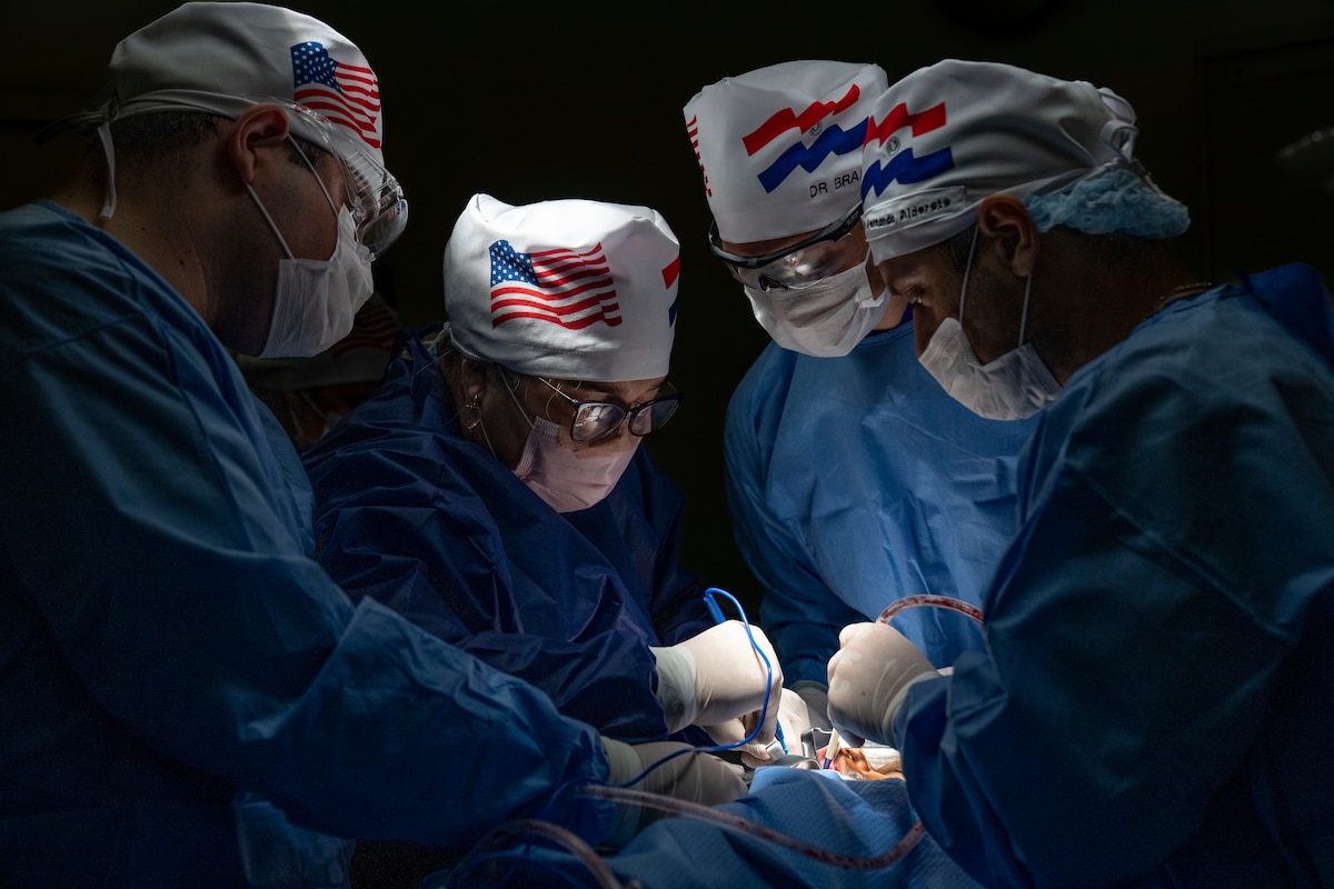 Image of medical professionals treating a patient.