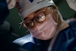 Image of medical professionals treating a patient.
