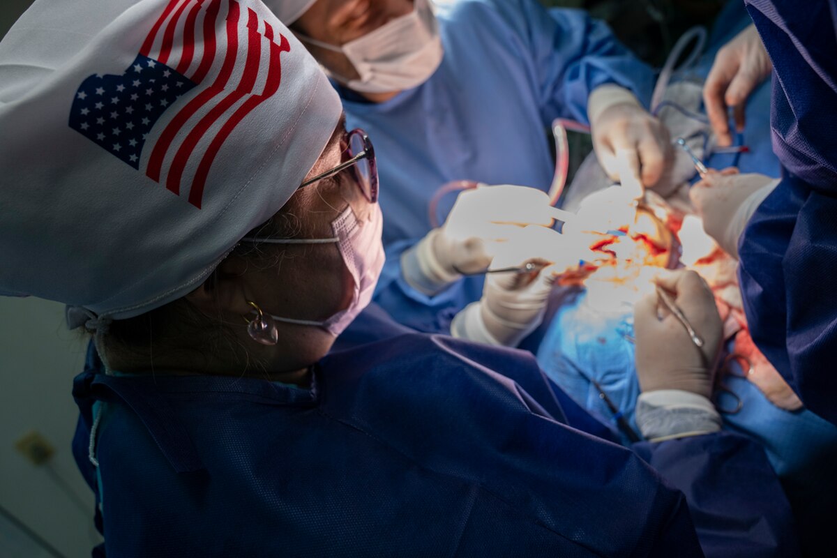 Image of medical professionals treating a patient.