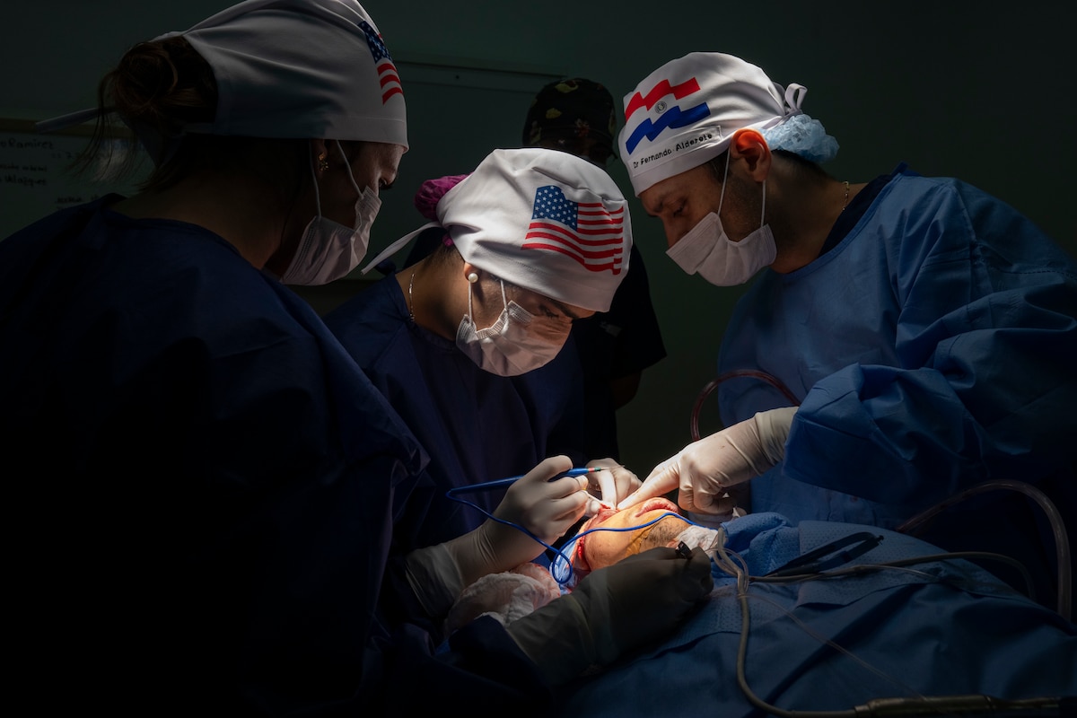 Image of medical professionals treating a patient.