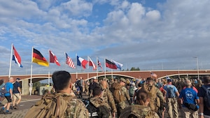 Thirteen U.S. Airmen from 1st Combat Communications Squadron join over 45,000 participants representing 70 countries during a 4-day ruck march across 106 miles in the Netherlands, July 15-18, 2025.