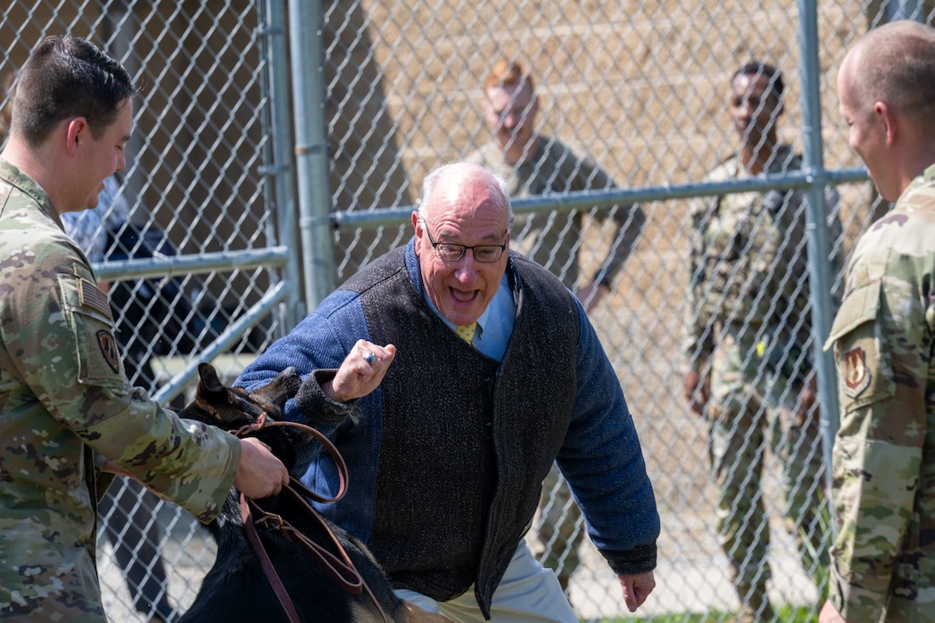 A member of the Congressional Staff Delegations tour gets a demonstration of a MWD bite during their visit to Wright-Patterson Air Force Base, Aug. 5, 2025. Congressional Staff Delegations (STAFFDELs) tours provide insight to different organizations on the base for better knowledge and understanding of operations.