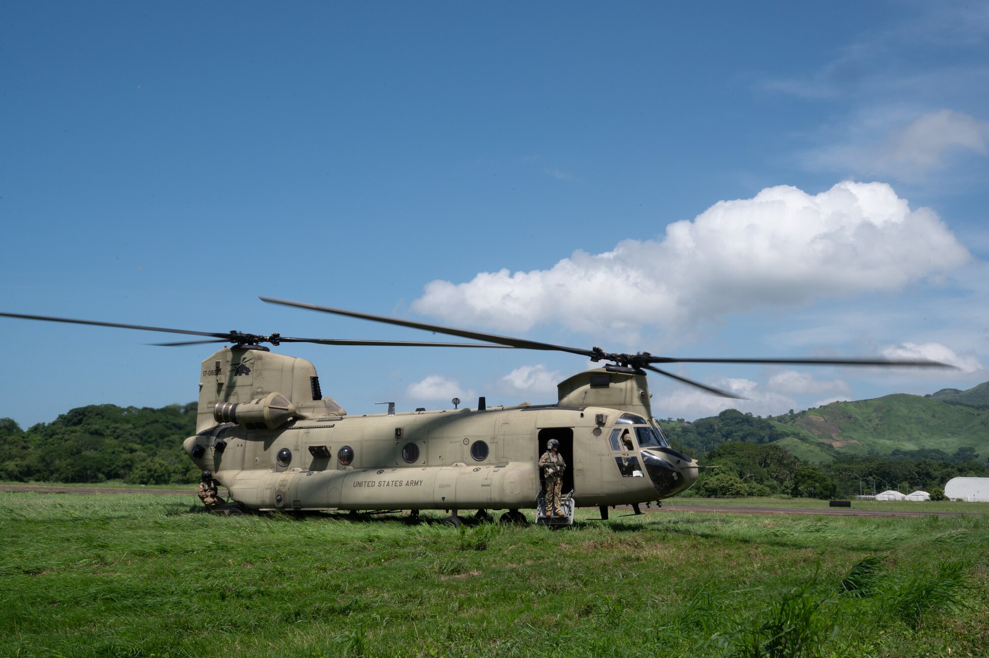 A CH-47 Chinook assigned to 1st Battalion, 228th Aviation Regiment, out of Soto Cano Air Base, Honduras, runs its engines during PANAMAX-Alpha Phase I, at Panama Pacific International Airport, Panama, July 14, 2025. By working with partner nations and leadership regionally, the U.S. creates unity of effort in addressing shared challenges such as transboundary and transregional criminality and region security. (U.S. Air Force photo by Staff Sgt. Sadie Colbert)