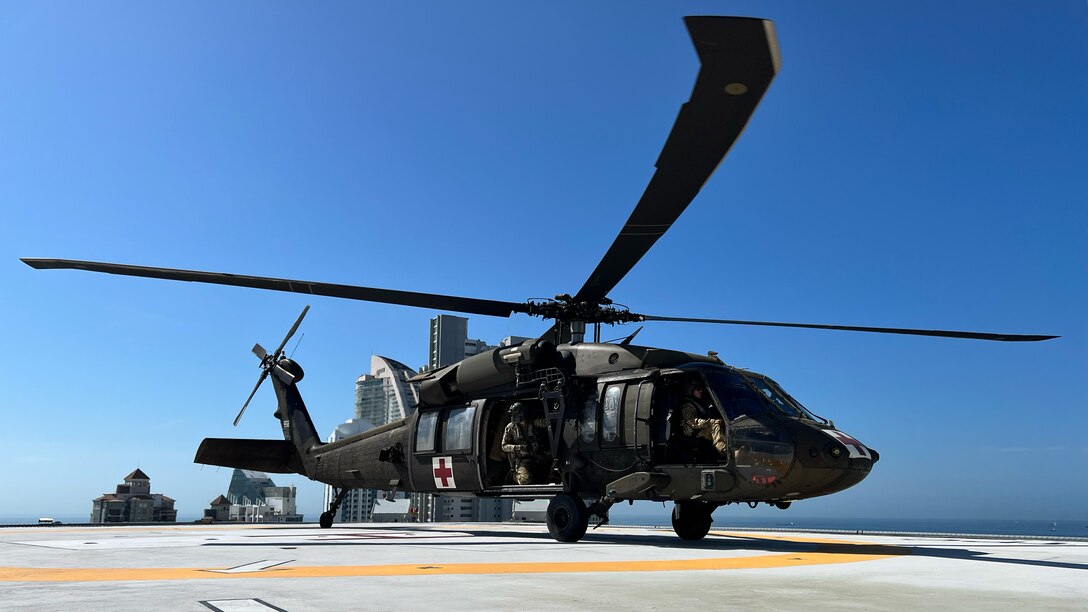 An HH-60 Blackhawk assigned to 1st Battalion, 228th Aviation Regiment, out of Soto Cano Air Base, Honduras, lands on a medical helicopter pad during PANAMAX-Alpha Phase I, at Panama City, Panama, July 17, 2025. PANAMAX Alpha aimed to build partner capacity, enhance regional security, and promote cooperative defense of critical infrastructure in the Western Hemisphere. (Courtesy Photo)