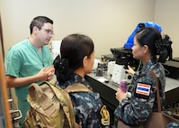 JOINT BASE SAN ANTONIO-FORT SAM HOUSTON – (Aug. 14, 2025) – Flight nurses from the Royal Thai Air Force speak with Dr. Daniel Thompson, a research scientist assigned to Naval Medical Research Unit (NAMRU) San Antonio’s Craniofacial Health and Restorative Medicine directorate, about a confocal microscope during a tour of laboratory facilities at the Battlefield Health and Trauma Research Institute. Four Royal Thai Air Force nurses visited medical commands within Joint Base San Antonio to enhance their nursing knowledge and skills to include advancing quality of nursing practice related to disease management. Navy Medicine Research & Development (NMR&D) contributes directly to positive working relationships with partner nation militaries, keeping the scope of Department of Defense capabilities wide, and at the ready, to address emerging threats aboard. NAMRU San Antonio, part of NMR&D, conducts gap-driven combat casualty care, craniofacial, and directed energy research in support of Navy, Marine Corps and joint U.S. warfighter health readiness and lethality while engaged in routine and expeditionary operations. (U.S. Navy photo by Burrell Parmer, NAMRU San Antonio Public Affairs/Released)