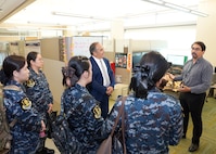 JOINT BASE SAN ANTONIO-FORT SAM HOUSTON – (Aug. 14, 2025) – Andres Martinez-Murillo (right), a principal investigator assigned to Naval Medical Research Unit (NAMRU) San Antonio’s Combat Casualty Care and Operational Medicine directorate, joined by Chief Science Director Dr. Darrin Frye, speaks with flight nurses from the Royal Thai Air Force about cold weather medical research at the Battlefield Health and Trauma Research Institute. The nurses visited medical commands within Joint Base San Antonio to enhance their nursing knowledge and skills to include advancing quality of nursing practice related to disease management. Navy Medicine Research & Development (NMR&D) contributes directly to positive working relationships with partner nation militaries, keeping the scope of Department of Defense capabilities wide, and at the ready, to address emerging threats aboard. NAMRU San Antonio, part of NMR&D, conducts gap-driven combat casualty care, craniofacial, and directed energy research in support of Navy, Marine Corps and joint U.S. warfighter health readiness and lethality while engaged in routine and expeditionary operations. (U.S. Navy photo by Burrell Parmer, NAMRU San Antonio Public Affairs/Released)