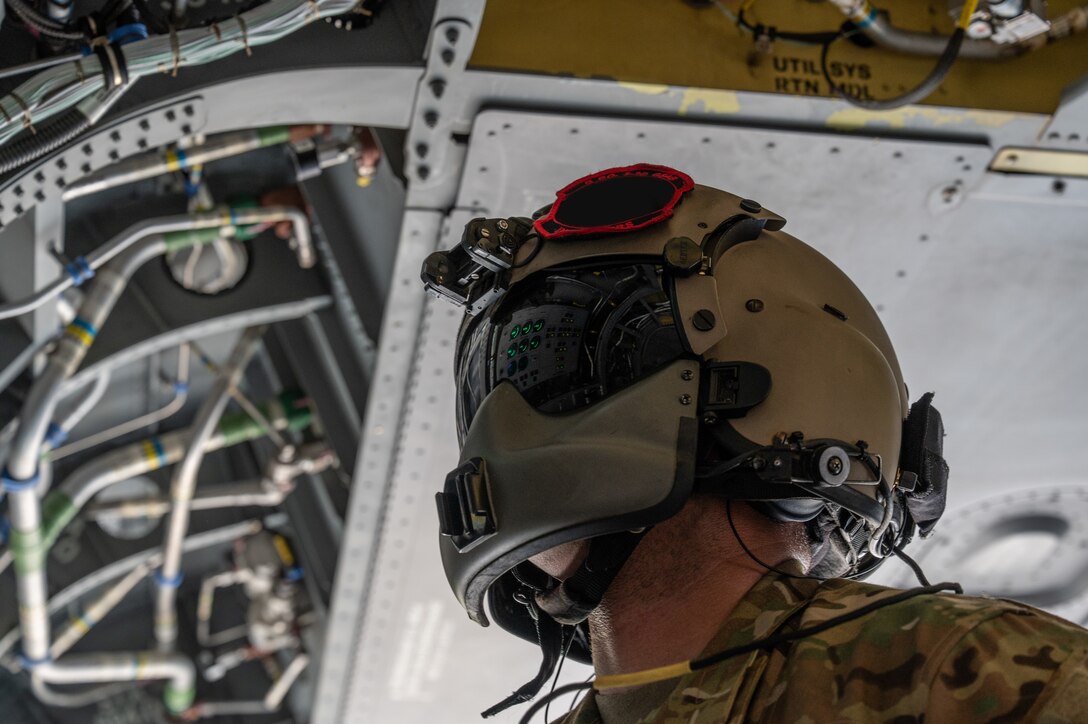 U.S. Army Sgt. Gabe Lucero, 1st Battalion, 228th Aviation Regiment crew chief, performs a CH-47 Chinook preflight inspection, at Soto Cano Air Base, Honduras, July 31, 2025. Joint Task Force-Bravo's helicopter activities, in collaboration with host nation and NATO military partners, showcase their unique ability to perform search and rescue operations and deliver humanitarian aid to remote environments. (U.S. Air Force photo illustration by Staff Sgt. Sadie Colbert)