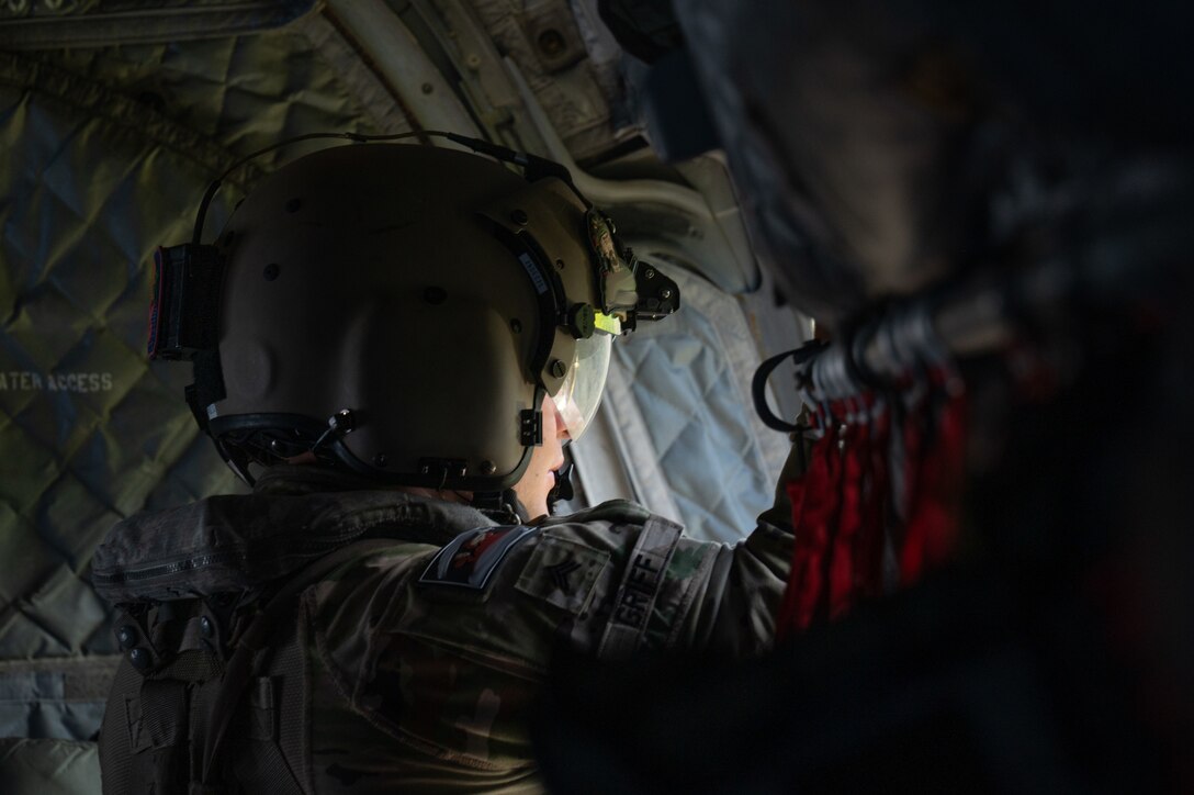 A U.S. Army CH-47 Chinook crew chief, 1st Battalion, 228th Aviation Regiment crew chief, assists in spotting illegal airstrips in Belize, during exercise AGILE BEAR, August 2, 2025. The comprehensive data collection enables Joint Task Force-Bravo’s quick response capability to mobilize personnel, assets, and supplies, preparing for critical assistance after disasters. The exercise's focus on countering regional threats, building partner nation capacity, and fostering regional interoperability is vital for increasing overall U.S. and partner nation readiness and regional security and stability. (U.S. Air Force photo by Staff Sgt. Sadie Colbert)