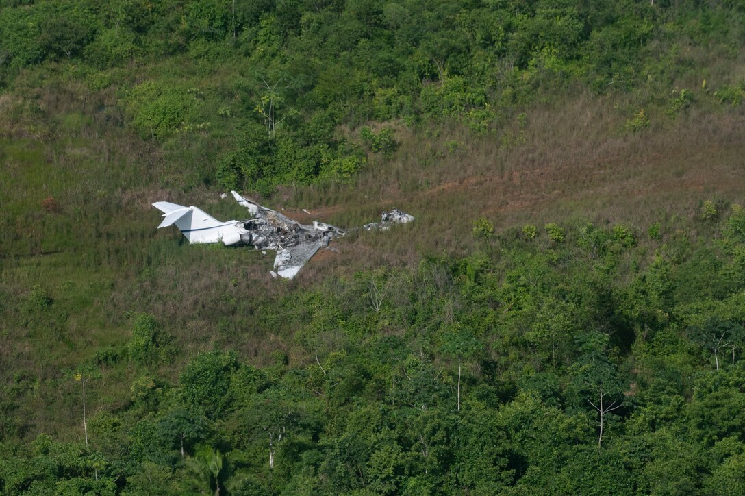 A crashed aircraft used for illicit activities was spotted in an illegal airstrip in Belize, August 2, 2025. As part of exercise AGILE BEAR 25, Joint Task Force-Bravo honed their Automated Route Reconnaissance Kit (ARRK) skills, which collected data on illegal landing strips in Belize. Exercises like AGILE BEAR increase our shared readiness to respond to natural disasters and security challenges through multifaceted capabilities ensuring our strength through unity and solidifying U.S. Southern Command's Joint Task Force-Bravo, as the partner of choice in Central America. (U.S. Air Force photo by Staff Sgt. Sadie Colbert)