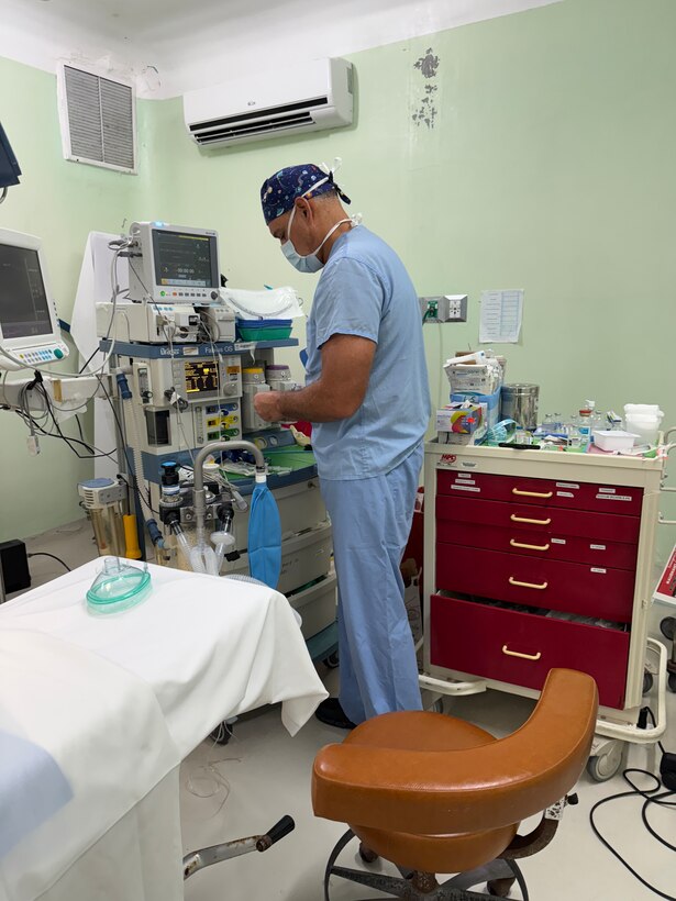 A Joint Task Force-Bravo anesthesiologist prepares the room for a patient, making sure all medication, equipment and instruments are available to conduct a gallbladder surgery during a JTF-Bravo surgical mission, Belmopan, Belize, Aug. 5, 2025. Through JTF-Bravo’s medical and surgical missions we strengthen our relationships with Central American nations by demonstrating U.S. commitment to regional stability and cooperation. Missions like these provide immediate health benefits, foster goodwill, mutual respect and collaboration between the U.S. military and local communities. (U.S. Air Force photo by Senior Airman Aaliyah Waalee)