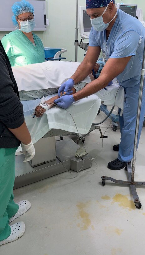 An anesthesiologist from Joint Task Force-Bravo provides a patient with anesthesia prior to conducting gallbladder surgery, during a JTF-Bravo surgical mission, Belmopan, Belize, Aug. 5, 2025.Surgical missions provide an opportunity for servicemembers to engage with the local community and give back to our neighbors while providing them with services that may otherwise be unavailable or in high demand. Since 1992, medical support to Central America has been a hallmark of JTF-Bravo’s presence in the region, improving overall health and long-term stability.  (U.S. Air Force photo by Senior Airman Aaliyah Waalee)