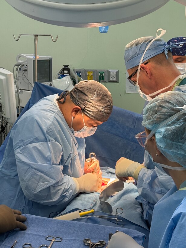 Belize surgeon, Dr. Zul, and U.S. Army surgeon Col. Romannuchi, conduct gallbladder and hernia surgeries during a JTF-Bravo surgical mission, Belmopan, Belize, Aug. 5, 2025.Surgical missions provide an opportunity for servicemembers to engage with the local community and give back to our neighbors while providing them with services that may otherwise be unavailable or in high demand. Since 1992, medical support to Central America has been a hallmark of JTF-Bravo’s presence in the region, improving overall health and long-term stability.  (U.S. Air Force photo by Senior Airman Aaliyah Waalee)