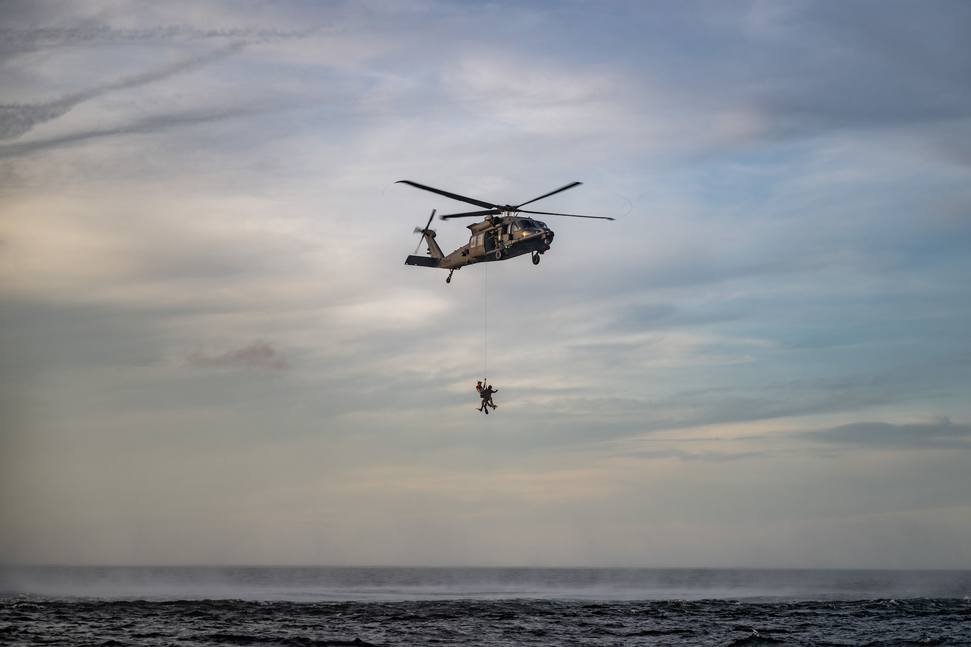 U.S. Air Force Airmen assigned to the 41st Rescue Squadron and pararescuemen assigned to the 38th Rescue Squadron, Moody Air Force Base, Georgia, conduct water rescue training in the Gulf of Mexico.