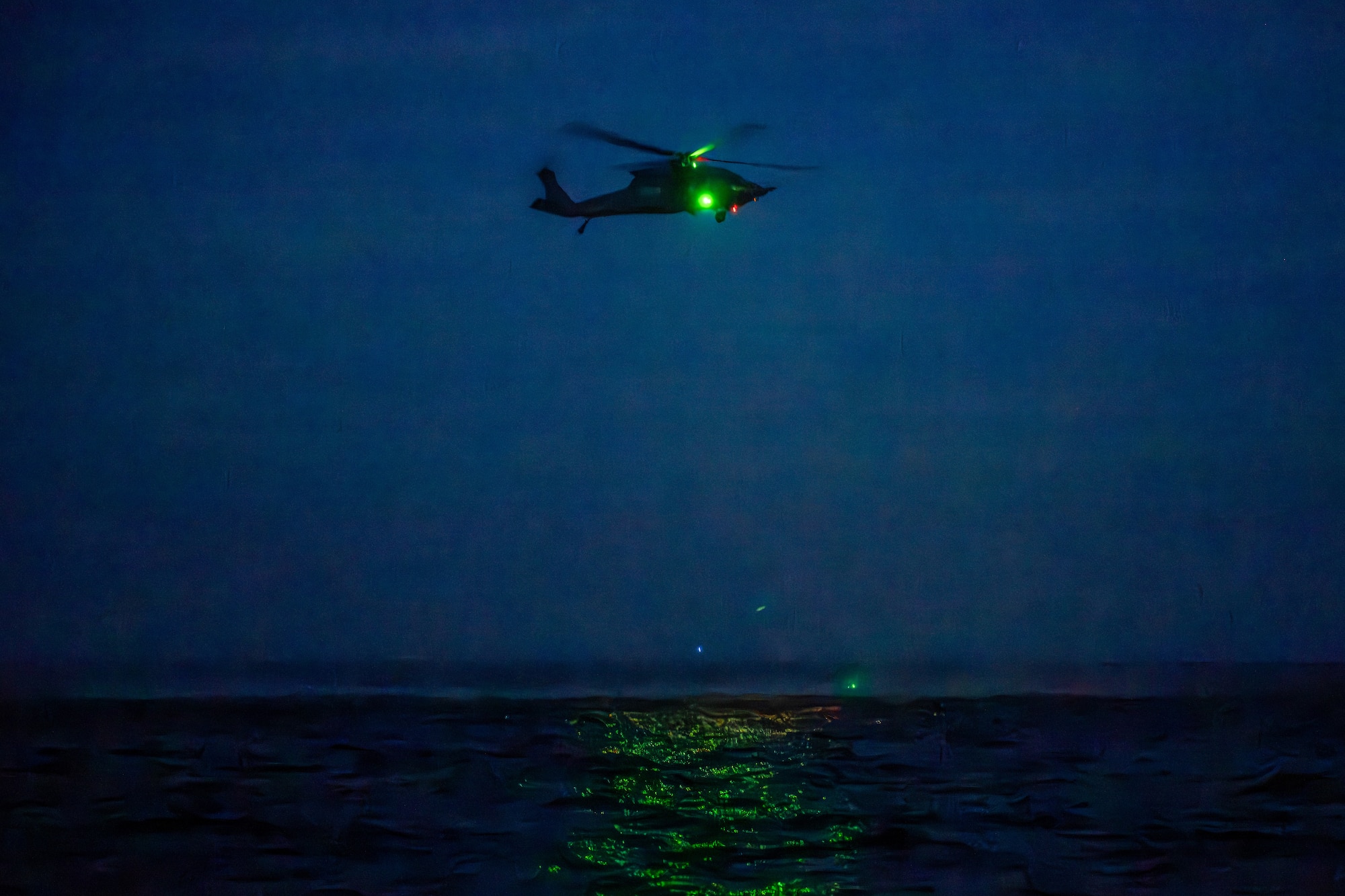 U.S. Air Force Airmen assigned to the 41st Rescue Squadron and pararescuemen assigned to the 38th Rescue Squadron, Moody Air Force Base, Georgia, conduct water rescue training in the Gulf of Mexico.