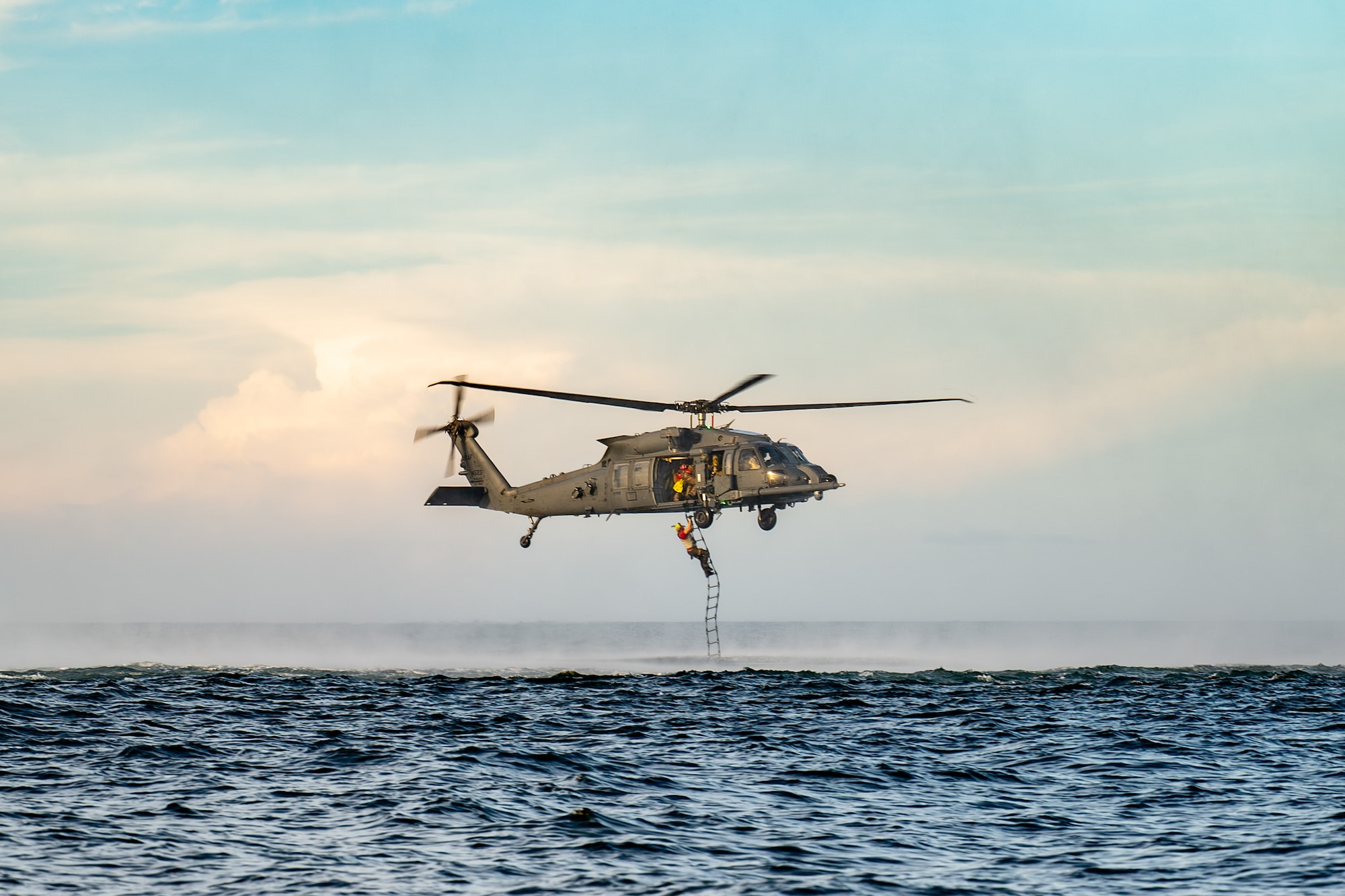 U.S. Air Force Airmen assigned to the 41st Rescue Squadron and pararescuemen assigned to the 38th Rescue Squadron, Moody Air Force Base, Georgia, conduct water rescue training in the Gulf of Mexico.
