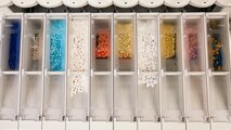 Various prescription medicines sit in the automated dispensing cabinet.