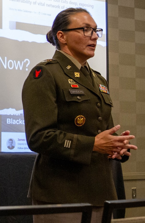 U.S. Army Lt. Col. Dayna Sanders, cyber program manager and deputy chief information officer for the Kentucky National Guard briefs officials on the Guard's Cyber Resilience Initiative at the Governor's Local Issues Conference in Louisville, Aug. 13, 2025.