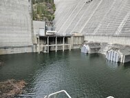 U.S. Army Corps of Engineers assessing the draft tube bulkheads and potential of an empty turbine bay at Dworshak Dam by flooding the space. This is part of design work for adding a fourth hydropower unit.