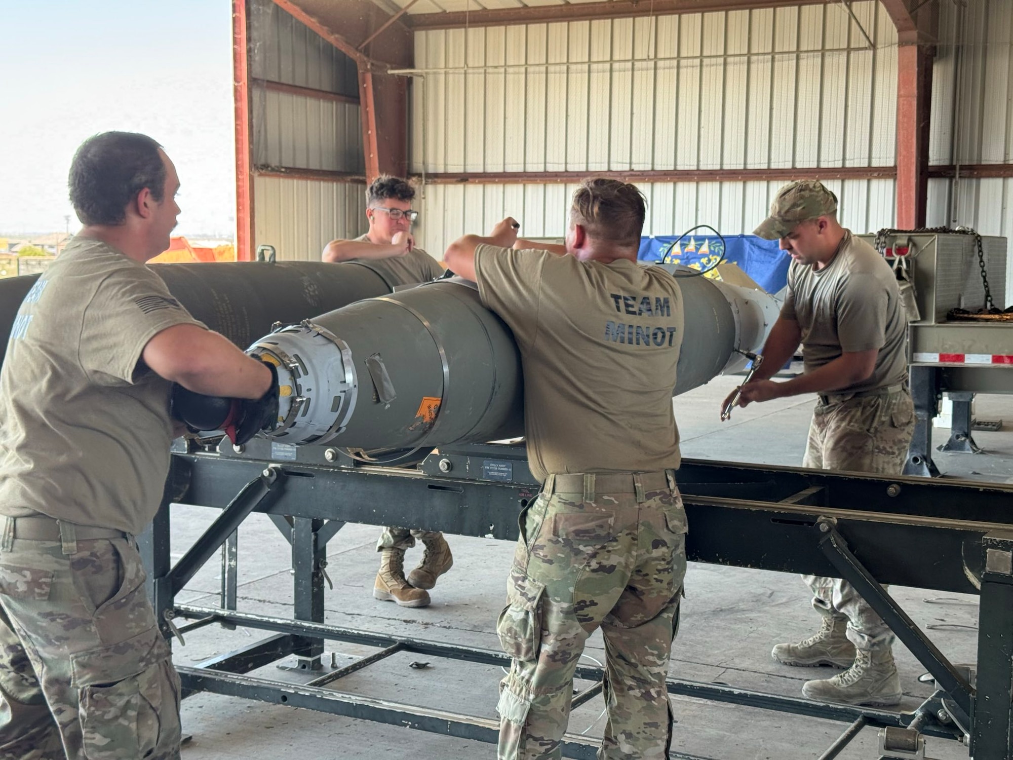 U.S. Air Force Airmen from the 5th Munitions (5MUNS) work on munitions during the 2025 Air Force Combat Operations Competition (AFCOCOMP) at Beale Air Force Base, California, August 12, 2025. AFCOCOMP is an annual competition that tests ammunition Airmen on their speed, efficiency and accuracy for wartime operations.