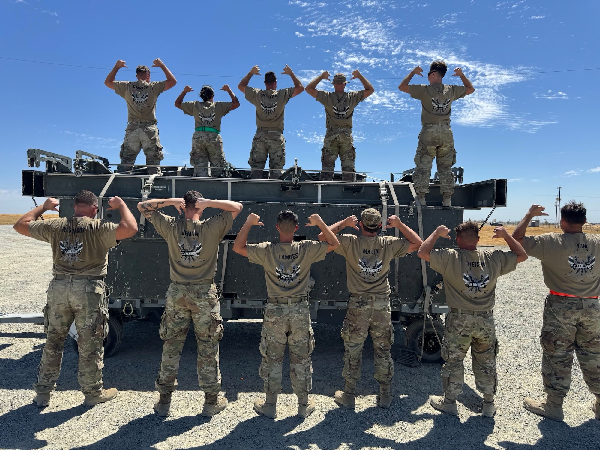 U.S. Air Force Airmen from the 5th Munitions (5MUNS) pose during the 2025 Air Force Combat Operations Competition at Beale Air Force Base, California, August 15, 2025. 5MUNS won 1st place this year for Team Minot.