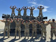 U.S. Air Force Airmen from the 5th Munitions (5MUNS) pose during the 2025 Air Force Combat Operations Competition at Beale Air Force Base, California, August 15, 2025. 5MUNS won 1st place this year for Team Minot.