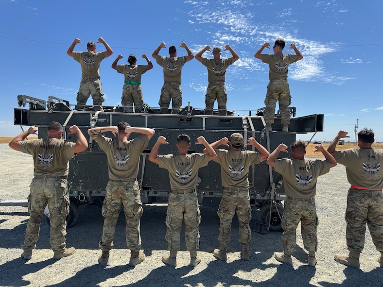 U.S. Air Force Airmen from the 5th Munitions (5MUNS) pose during the 2025 Air Force Combat Operations Competition at Beale Air Force Base, California, August 15, 2025. 5MUNS won 1st place this year for Team Minot.