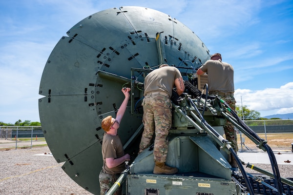 U.S. Space Force Guardians assigned to the 25th Space Range Squadron, Space Delta 11, adjust an antenna outside a Transportable Range Operations Center (TROC) during exercise Resolute Space 2025 in Pearl City, Hawaii, July 24, 2025.