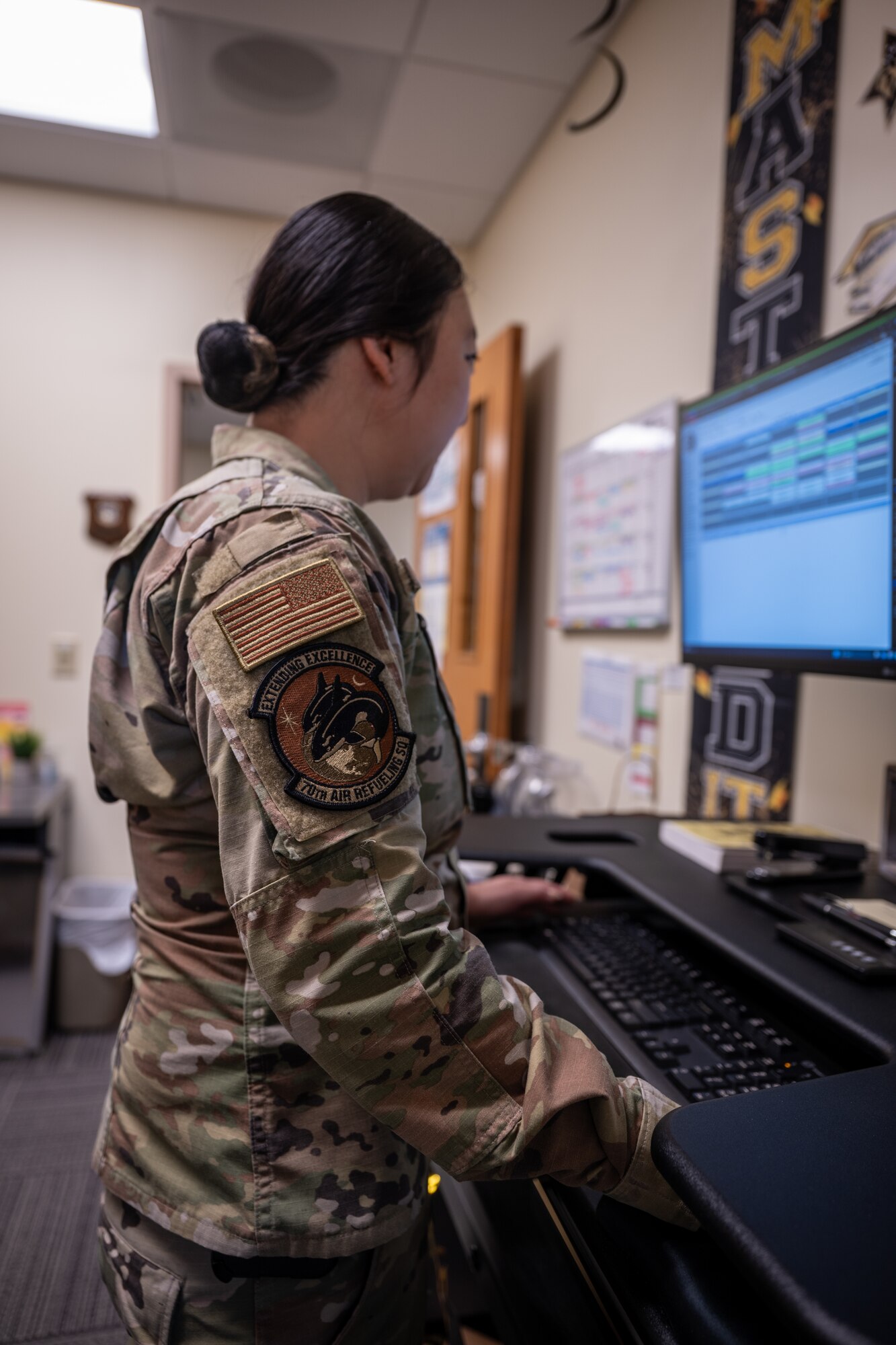 U.S. Air Force Staff Sgt. Michelle Moua, a Squadron Aviation Resource Management (SARM) specialist assigned to the 70th Aerial Refueling Squadron, performs her duties at Travis AFB, Calif., August 20, 2025. Moua was recognized with the American Red Cross Service to Armed Forces Award on June 7, 2025 for her volunteer work at David Grant Medical Center. She also recently completed a Master's Degree in Public Health Administration and continues to serve with excellence as a Reserve Airman in the Air Force Reserve.