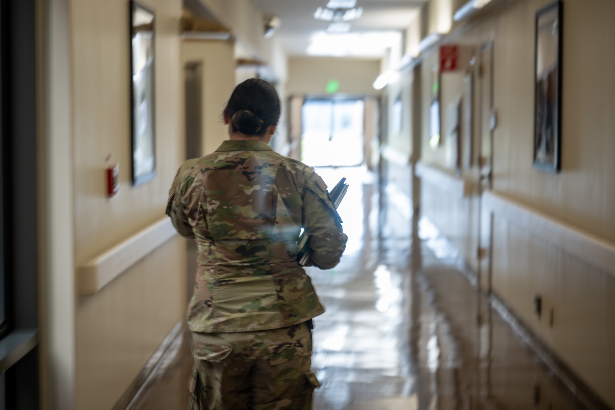 U.S. Air Force Staff Sgt. Michelle Moua, a Squadron Aviation Resource Management specialist assigned to the 70th Aerial Refueling Squadron, walks to the Red Cross volunteer office at Travis AFB, Calif., August 20, 2025. Moua was recognized with the American Red Cross Service to Armed Forces Award on June 7, 2025 for her volunteer work at David Grant Medical Center. She also recently completed a Master's Degree in Public Health Administration and continues to serve with excellence as a Reserve Airman in the Air Force Reserve.