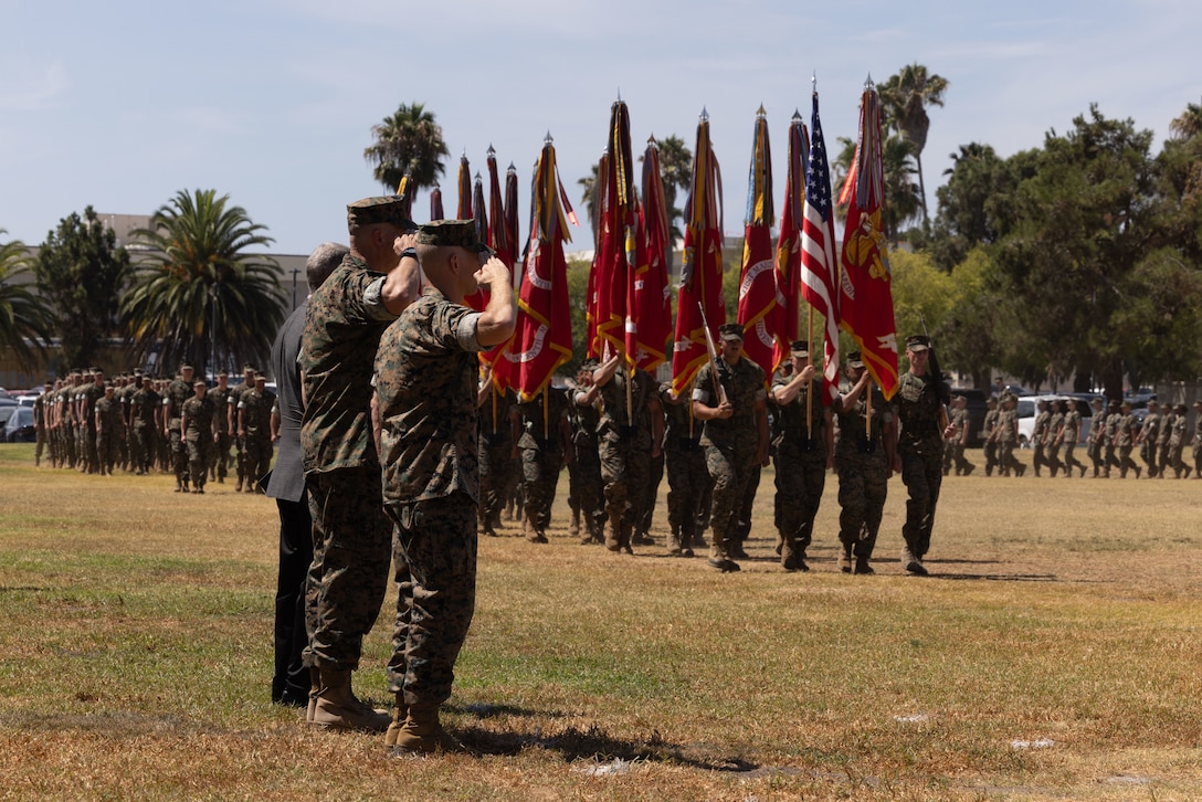 The I Marine Expeditionary Force commanding general salutes the colors with past I MEF commanding generals during the I MEF change of command ceremony at Marine Corps Base Camp Pendleton, California, Aug. 21, 2025