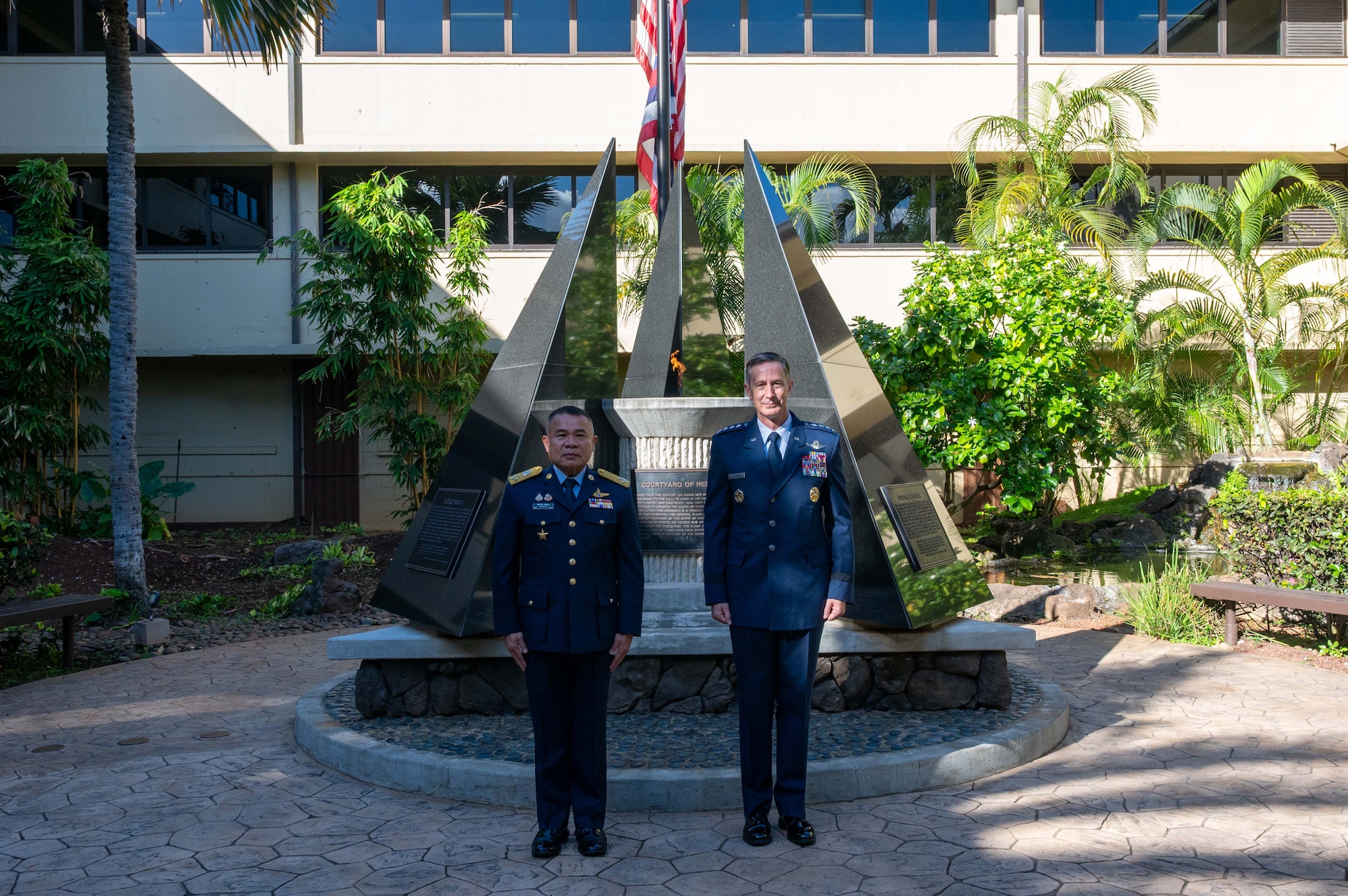 Gen. Kevin B. Schneider, Commander of Pacific Air Forces, and Air Chief Marshal Panthpakdee Pattanakul, Commander of the Royal Thai Air Force (RTAF), pose for photo at Pacific Air Force Headquarters