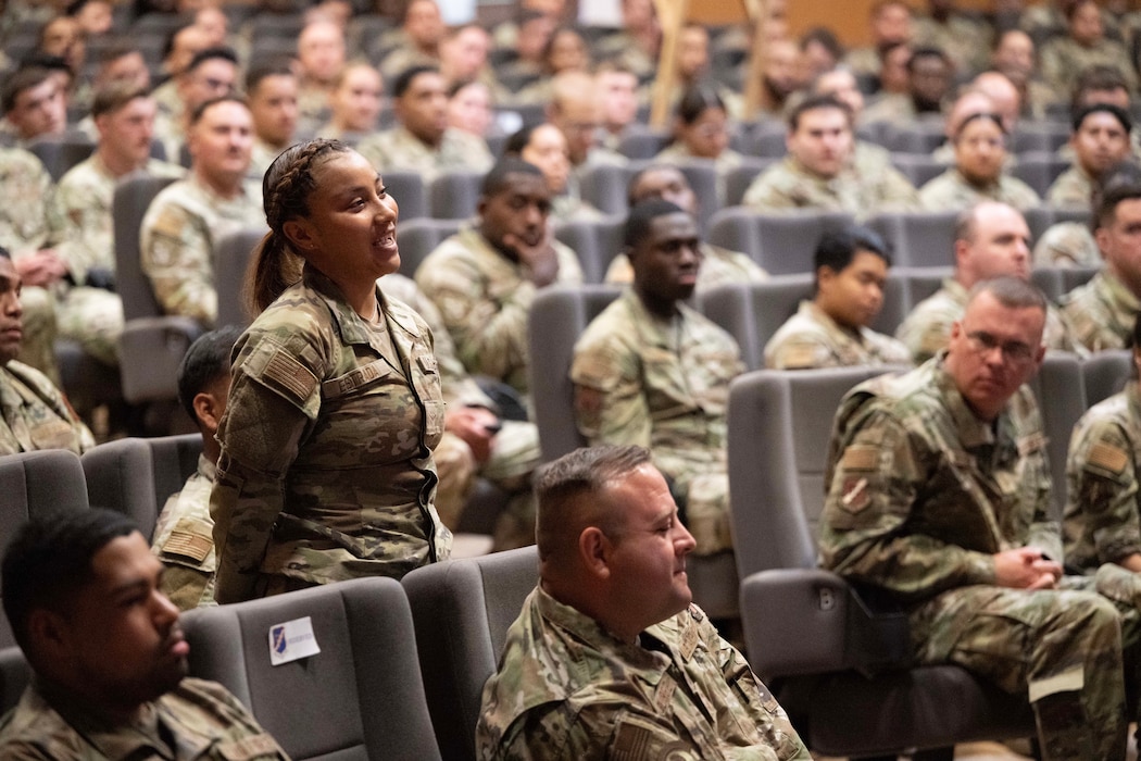 An Airman assigned to the 39th Air Base Wing, asks Chief Master Sgt. of the Air Force David Flosi, a question during an all call at Incirlik Air Base, Türkiye, August 14, 2025.