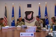 U.S. Air Force Gen. Kevin Schneider, Pacific Air Forces commander, and U.S. Army Gen. Ronald Clark, U.S. Army Pacific commander, hosted the next iteration of the Cross-Component Integration Forum to discuss strategies and best practices for fostering greater interoperability and integration among the U.S. Army and Air Force units in the Indo-Pacific at Joint Base Pearl Harbor-Hickam, Hawaii, Aug. 19, 2025. This collaboration is essential for cohesive joint operations, especially in implementing Agile Combat Employment (ACE) and Multi-Domain Operations (MDO). (U.S. Air Force photo by Staff Sgt. Elizabeth Taranto)

The two leaders are seated at a large table alongside other leaders in their commands.