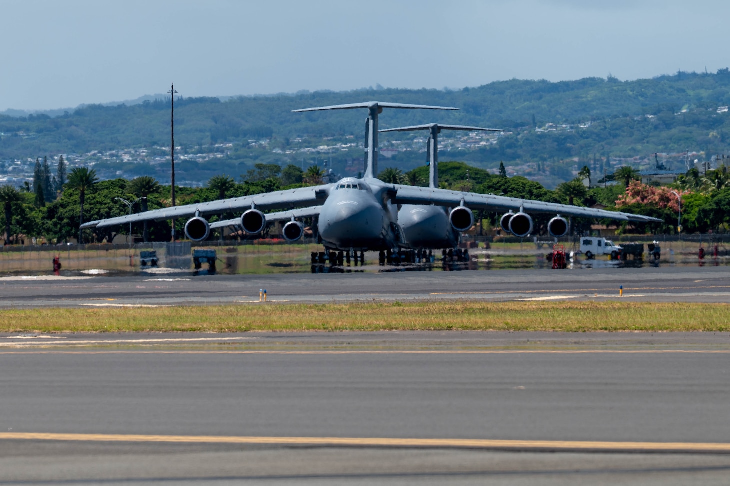 Two U.S Air Force C-5M Super Galaxies are parked in support of the Air Force’s Department-Level Exercise on Joint Base Pearl Harbor-Hickam, Hawaii, July 11, 2025.
