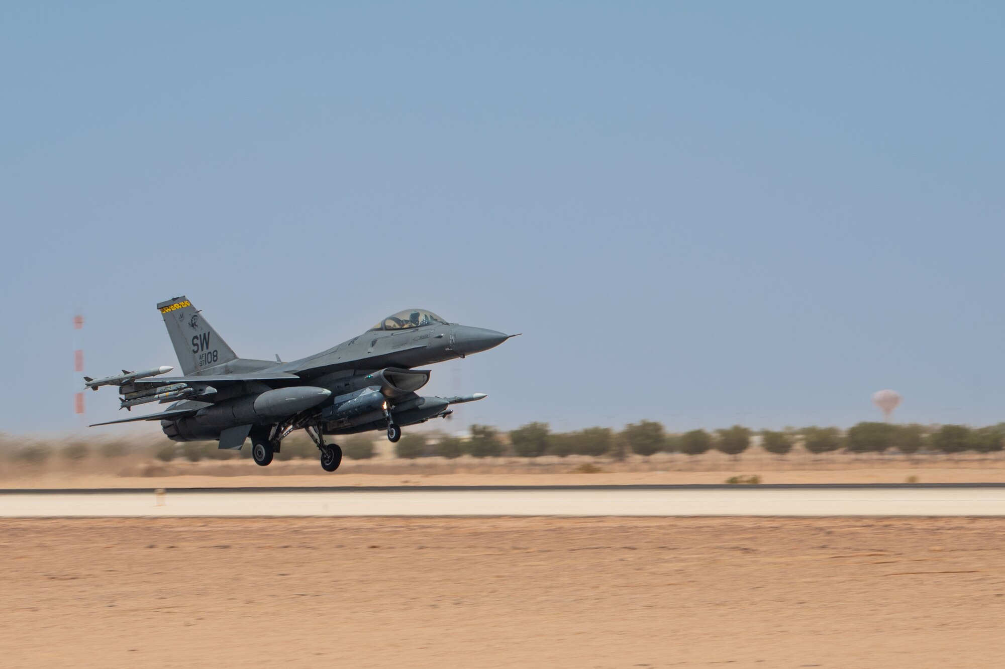 A U.S. Air Force F-16 Fighting Falcon assigned to the 79th Expeditionary Fighter Squadron takes off.