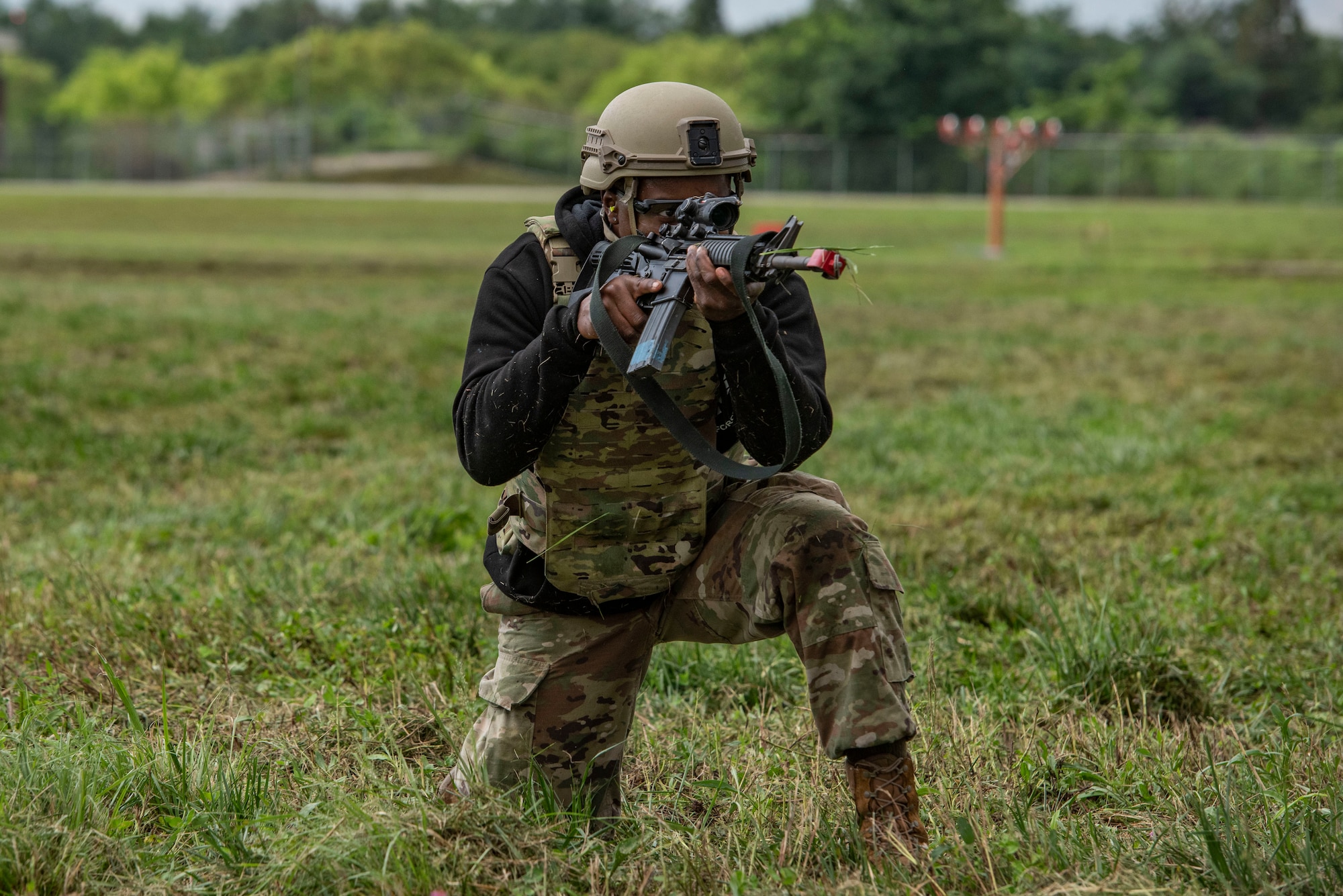 A U.S. Air Force Airman acts as an opposing force
member during a simulated base attack during Ulchi
Freedom Shield 25 at Osan Air Base, Republic of
Korea, Aug. 19, 2025.
