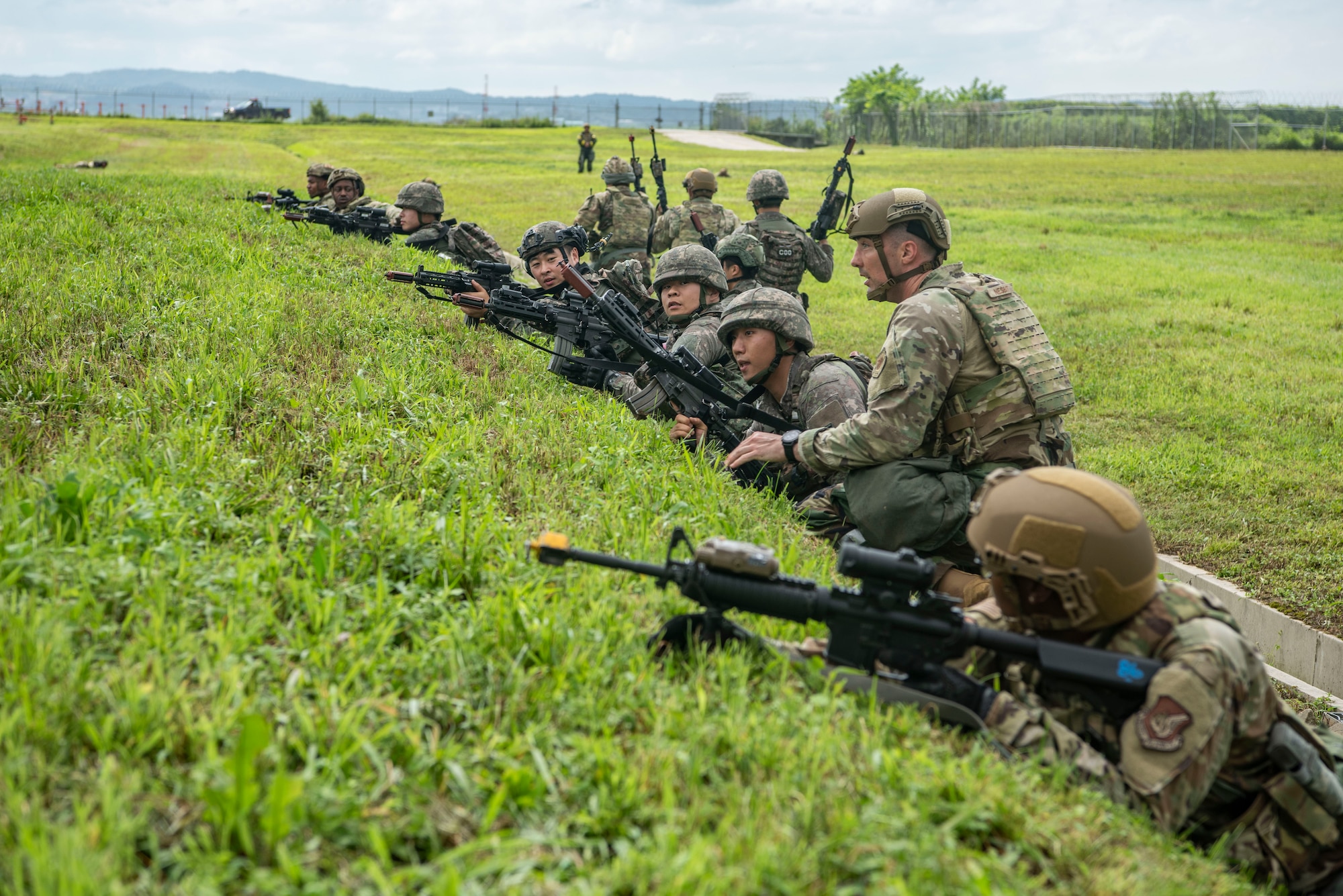 Airmen from the U.S. Air Force and the Republic of
Korea Air Force respond to a simulated ground attack
during Ulchi Freedom Shield 25 at Osan Air Base,
ROK, Aug. 19, 2025.