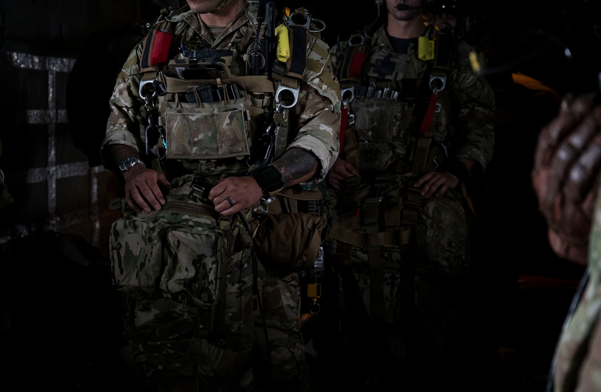 Airmen preparing to jump from C-130