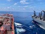 Japan Maritime Self-Defense Force Mashū-class replenishment ship JS Ōmi (AOE-426) connects to Military Sealift Command’s commercial charter motor tanker Stena Imperative during a consolidated cargo replenishment at sea west of Kyushu, Japan, Aug. 15, 2025.