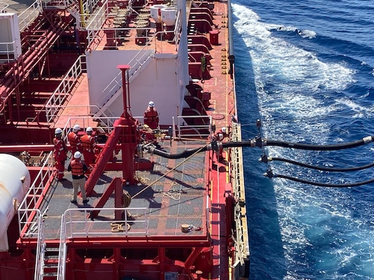 Military Sealift Command’s commercial charter motor tanker Stena Imperative disconnects fuel lines from Japan Maritime Self-Defense Force Mashū-class replenishment ship JS Ōmi (AOE-426) during a consolidated cargo replenishment at sea west of Kyushu, Japan, Aug. 15, 2025.