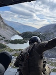 A HH60M Black Hawk medical evacuation helicopter of the Montana Army National Guard’s 1-189th General Support Aviation Battalion rescues three hikers from the Princess Lake area of the Absaroka-Beartooth Wilderness on Aug 17, 2025.