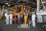 Cmdr. Adam Ochs, commanding officer of the Independence-variant littoral combat ship USS Santa Barbara (LCS 32) poses for a photo with senior Sri Lankan defense officials in the mission bay during a tour, Aug. 16, 2025. Santa Barbara conducted a port visit to Colombo, Sri Lanka while on a rotational deployment to the U.S. 7th Fleet area of operations to strengthen partnerships in the South Asia region. (U.S. Navy photo by Electronics Technician 2nd Class Alexander Klee)