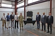 250820-A-BS696-2039



CHAMBERSBURG, Pa. – Col. Caleb Lewis (1st left of pelican case), Letterkenny Army Depot commander, and members of the LEAD command team, stand with Mike Pollut (1st right of pelican case), Unmanned Aircraft Systems Logistics Division chief, Dave Carter, UAS Sustainment director, and Ben White, UAS Product Support manager, after the opening ceremony at LEAD on Aug. 20.



For the first time in U.S. Army history, the first Army-owned supply, storage, and distribution operations center for Unmanned Aircraft Systems opened on an organic industrial base.



(U.S. Army photo/Pam Goodhart)