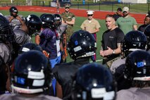 U.S. Marine Corps Gunnery Sgt. Daniel Evans, the station commander of Recruiting Sub Station Brockton, Recruiting Station Boston, gives remarks to the Randolph High School football team during Marine Week Boston, Aug. 21, 2025. During Marine Week Boston, Marines with Marine Corps Recruiting Command shared Marine Corps traditions with local high schools in honor of the Corps’ 250th birthday. Marines stationed across the globe commemorate the 250th anniversary of the Marine Corps, honoring a distinguished legacy of service, sacrifice, and unwavering fidelity to both the nation and fellow Marines. (U.S. Marine Corps photo by Sgt. Aidan Hekker)